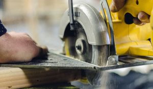 circular saw cutting wood for home construction